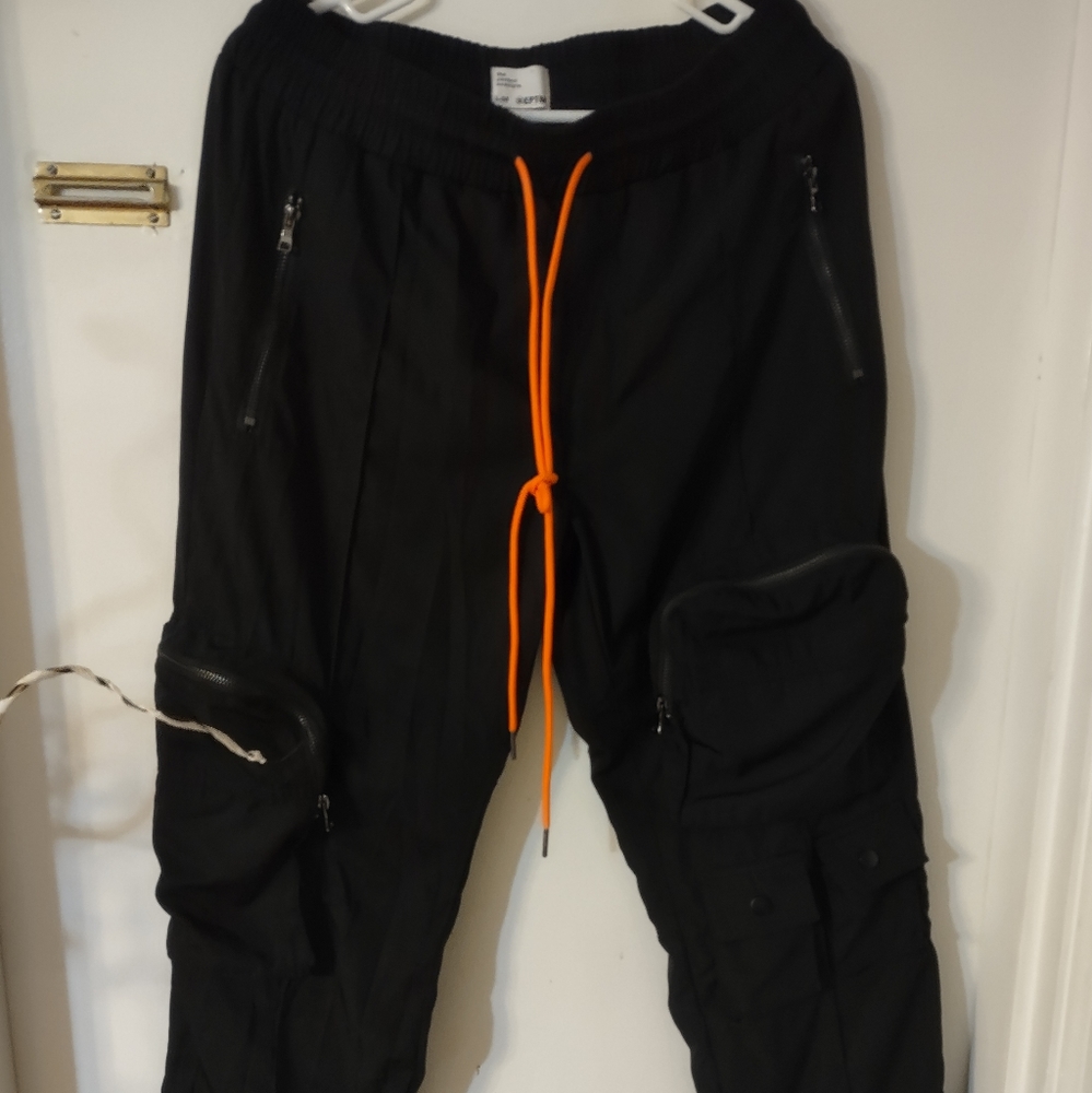 Men Black and light blue boohoo Cargo pants available. expandable Size 34-38